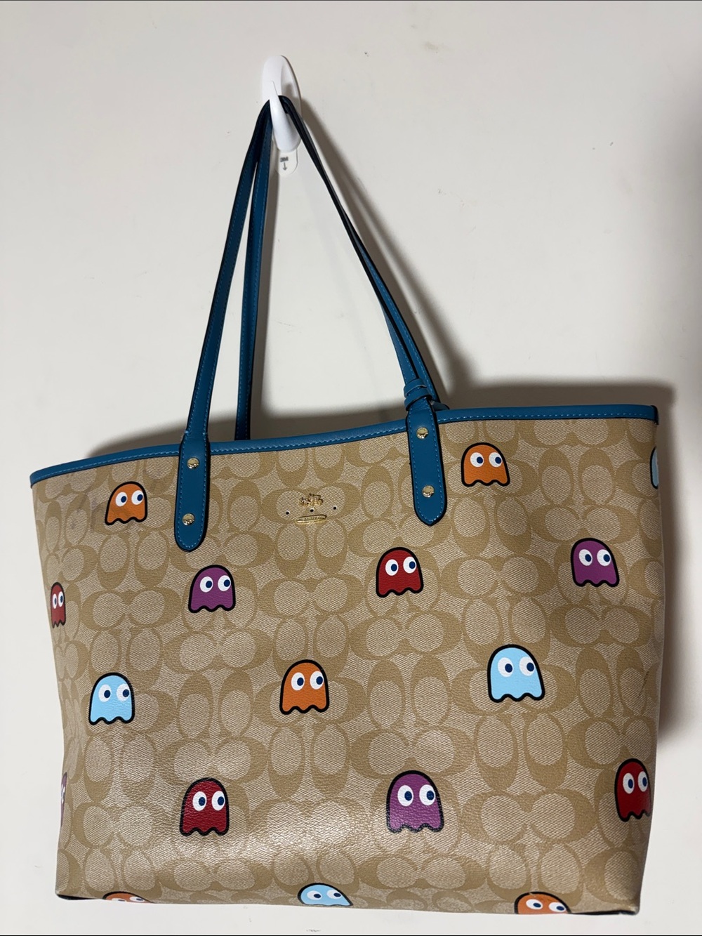 Coach Beige Signature Canvas Tote with Blue Trim and Multicolor Ghost Motif